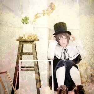 Rating: Safe Score: 0 Tags: 1boy brown_hair hand_on_headwear hat necktie pants sitting solo souseiseki striped top_hat User: admin