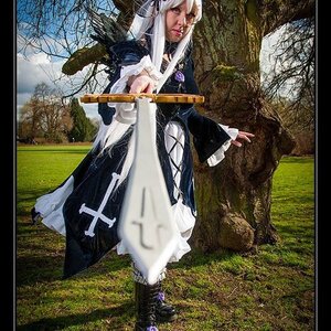 Rating: Safe Score: 0 Tags: 1girl black_border border grass letterboxed lips long_hair outdoors purple_eyes solo suigintou tree weapon white_hair User: admin