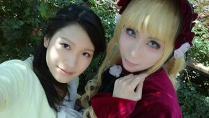 Rating: Safe Score: 0 Tags: 2girls bangs black_eyes black_hair blonde_hair blue_eyes flower lips long_hair looking_at_viewer multiple_girls portrait realistic shinku smile solo User: admin