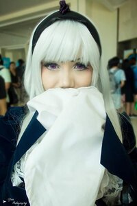 Rating: Safe Score: 0 Tags: 1girl bangs black_hairband blunt_bangs blurry blurry_background blurry_foreground depth_of_field gloves hairband looking_at_viewer photo purple_eyes solo suigintou upper_body weapon User: admin