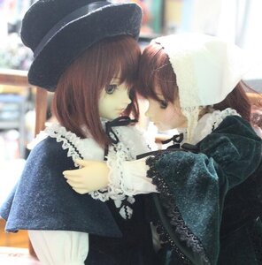Rating: Safe Score: 0 Tags: 2girls bangs blue_eyes blurry brown_hair building city depth_of_field doll dress hat long_hair long_sleeves looking_at_another multiple_dolls multiple_girls profile suiseiseki tagme upper_body User: admin