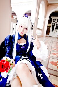 Rating: Safe Score: 0 Tags: 1girl albino blurry depth_of_field dress flower long_hair nail_polish red_eyes ribbon rose sitting solo suigintou white_hair User: admin