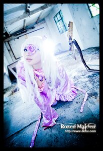Rating: Safe Score: 0 Tags: 1girl barasuishou black_border dress english_text eyepatch flower hair_ornament letterboxed long_hair pillarboxed purple_eyes solo weapon white_hair User: admin