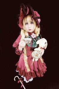 Rating: Safe Score: 0 Tags: 1girl black_background blonde_hair blue_eyes bonnet bow bunny dress flower holding looking_at_viewer ribbon shinku simple_background solo stuffed_animal teacup User: admin