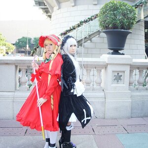 Rating: Safe Score: 0 Tags: 1boy blonde_hair building city coat dress hat long_hair looking_at_viewer multiple_cosplay multiple_girls outdoors standing tagme User: admin