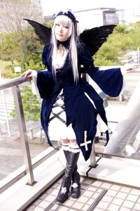 Rating: Safe Score: 0 Tags: 1girl angel_wings black_wings blue_dress blurry boots depth_of_field dress feathered_wings feathers full_body gothic_lolita long_hair long_sleeves solo standing suigintou wings User: admin
