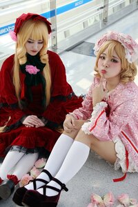Rating: Safe Score: 0 Tags: 2girls blonde_hair bonnet closed_eyes dress flower frills hat mary_janes multiple_cosplay multiple_girls realistic rose shinku shoes siblings sitting tagme white_legwear User: admin
