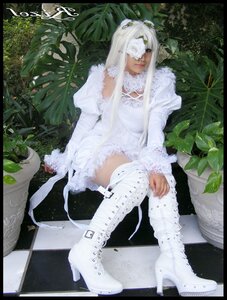 Rating: Safe Score: 0 Tags: 1girl argyle black_border blindfold checkered checkered_floor dress kirakishou letterboxed lips long_hair mask pillarboxed plant sitting solo tile_floor tiles white_hair User: admin