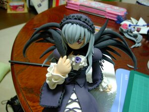 Rating: Safe Score: 0 Tags: 1girl black_dress blurry blurry_background blurry_foreground depth_of_field doll dress figure frilled_sleeves frills hair_over_one_eye hairband indoors lolita_hairband long_hair long_sleeves photo red_eyes solo stained_glass standing suigintou wings User: admin