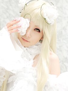 Rating: Safe Score: 0 Tags: 1girl bare_shoulders blonde_hair blurry earrings eyelashes jewelry kirakishou lips long_hair looking_at_viewer nail_polish sleeves_past_wrists solo sweater white_theme User: admin