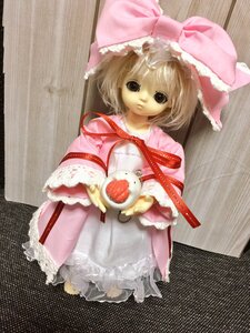 Rating: Safe Score: 0 Tags: 1girl black_eyes blonde_hair bow doll dress food hinaichigo long_sleeves looking_at_viewer pink_dress solo User: admin
