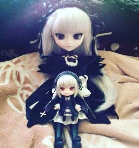 Rating: Safe Score: 0 Tags: 2girls blonde_hair doll dress feathers frills hairband long_hair long_sleeves looking_at_viewer multiple_girls red_eyes ribbon solo suigintou water wings User: admin
