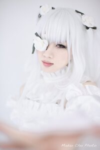 Rating: Safe Score: 0 Tags: 1girl artist_name blurry blurry_background bug depth_of_field flower hair_ornament insect kirakishou lips looking_at_viewer portrait red_lips ribbed_sweater smile solo sweater white_flower white_hair User: admin