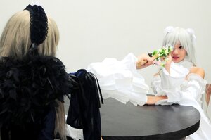 Rating: Safe Score: 0 Tags: 2girls blonde_hair bouquet dress flower multiple_cosplay multiple_girls short_hair sitting tagme veil white_dress User: admin
