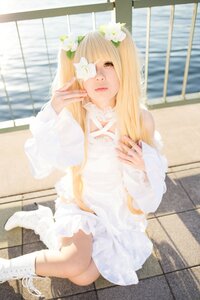 Rating: Safe Score: 0 Tags: 1girl bangs blonde_hair blunt_bangs blurry depth_of_field dress flower hair_flower hair_ornament kirakishou lace lips long_hair long_sleeves sitting solo white_dress User: admin