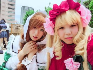 Rating: Safe Score: 0 Tags: 3girls blonde_hair bonnet building city flower hat hood lips long_hair multiple_cosplay multiple_girls skirt tagme User: admin