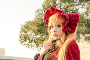 Rating: Safe Score: 0 Tags: 1girl bangs blonde_hair blue_eyes blurry bonnet depth_of_field flower lips long_hair looking_at_viewer nose realistic rose shinku solo upper_body User: admin
