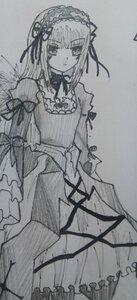 Rating: Safe Score: 0 Tags: 1girl closed_mouth dress eyebrows_visible_through_hair frills hairband image juliet_sleeves lolita_hairband long_hair long_sleeves looking_at_viewer monochrome ribbon simple_background solo standing suigintou traditional_media wide_sleeves wings User: admin