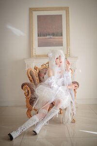 Rating: Safe Score: 0 Tags: 1girl animal_ears bare_shoulders dress kirakishou long_hair sitting solo white_dress white_footwear white_hair User: admin