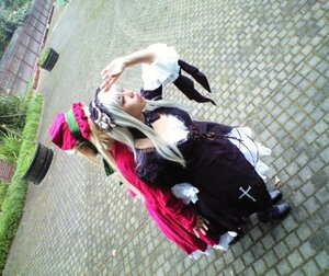 Rating: Safe Score: 0 Tags: 1girl 3d black_dress blonde_hair blurry chain-link_fence closed_eyes dress fence fishnet_legwear fishnets flower frills gothic_lolita hair_ornament hexagon honeycomb_(pattern) honeycomb_background lolita_fashion long_hair long_sleeves outdoors pavement photo rooftop solo stained_glass standing suigintou tile_floor tile_wall tiles wings User: admin