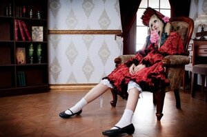 Rating: Safe Score: 0 Tags: 1girl blonde_hair chair dress flower lolita_fashion long_hair mary_janes red_dress shinku shoes sitting socks solo umbrella User: admin