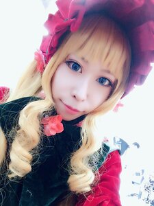 Rating: Safe Score: 0 Tags: 1girl artist_name bangs blonde_hair blue_eyes closed_mouth eyelashes flower fur_trim hat lips long_hair looking_at_viewer shinku solo striped upper_body User: admin