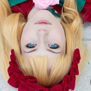 Rating: Safe Score: 0 Tags: 1girl bangs blonde_hair blue_eyes bow eyelashes flower lips looking_at_viewer nose pink_lips portrait realistic rose shinku short_hair solo User: admin