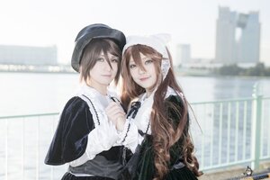 Rating: Safe Score: 0 Tags: 2girls artist_name bangs blurry brown_hair building city depth_of_field dress hair_between_eyes hat lips long_hair long_sleeves looking_at_viewer multiple_cosplay multiple_girls outdoors short_hair smile tagme User: admin