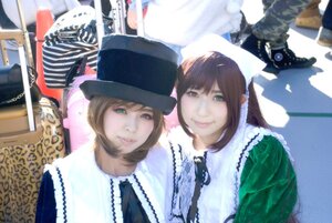 Rating: Safe Score: 0 Tags: 2girls bangs blue_eyes brown_hair hat lace lips looking_at_viewer multiple_cosplay multiple_girls short_hair smile striped tagme vertical_stripes User: admin