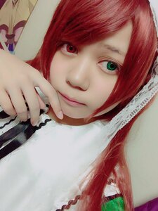 Rating: Safe Score: 0 Tags: 1girl chain face green_eyes hands lips red_hair short_hair smile solo suiseiseki User: admin