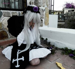 Rating: Safe Score: 0 Tags: 1girl dark_skin dress flower hair_ornament hair_over_eyes long_hair rain sitting solo suigintou white_hair User: admin