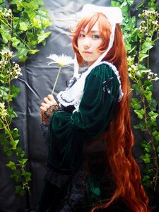Rating: Safe Score: 0 Tags: 1girl dress from_side green_dress green_eyes heterochromia leaf lips long_hair long_sleeves looking_at_viewer orange_hair outdoors plant red_eyes solo standing suiseiseki tree very_long_hair vines watering_can User: admin