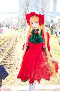 Rating: Safe Score: 0 Tags: 1girl blonde_hair blue_eyes blurry bonnet bow building depth_of_field dress flower long_hair looking_at_viewer photo red_dress rose shinku solo User: admin