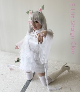 Rating: Safe Score: 0 Tags: 1girl animal_ears boots dress flower high_heel_boots high_heels kirakishou lips long_hair solo sweater thighhighs white_legwear User: admin