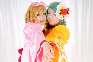 Rating: Safe Score: 0 Tags: 2girls blonde_hair bow flower green_eyes green_hair hair_flower hair_ornament holding_hands kagamine_rin lips multiple_cosplay multiple_girls one_eye_closed realistic short_hair striped tagme vertical_stripes User: admin