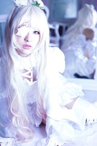 Rating: Safe Score: 0 Tags: 1girl blurry blurry_background blurry_foreground depth_of_field dress frills kirakishou lips long_hair pale_skin photo sitting solo white_hair User: admin