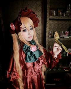 Rating: Safe Score: 0 Tags: 1girl auto_tagged bird blonde_hair blue_eyes bow dress flower hat lips long_hair red_dress rose shinku solo User: admin