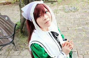 Rating: Safe Score: 0 Tags: 1girl black_ribbon brown_hair building dress hat head_scarf heterochromia lips long_hair long_sleeves looking_at_viewer outdoors red_eyes ribbon solo suiseiseki tree User: admin