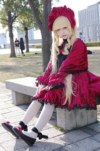 Rating: Safe Score: 0 Tags: 1girl bangs blonde_hair bonnet day dress frills lolita_fashion long_hair looking_at_viewer outdoors pavement red_dress shinku solo standing tree User: admin