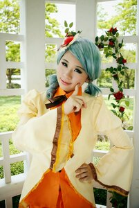 Rating: Safe Score: 0 Tags: 1girl flower hand_on_hip kanaria lips looking_at_viewer realistic smile solo window User: admin