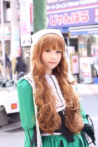 Rating: Safe Score: 0 Tags: 1girl artist_name bangs blonde_hair blurry blurry_background blurry_foreground city depth_of_field dress green_dress lips long_hair looking_at_viewer outdoors photo solo suiseiseki User: admin