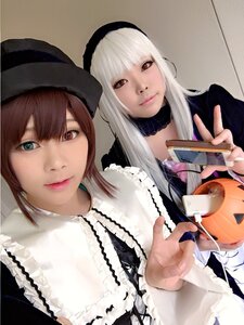 Rating: Safe Score: 0 Tags: 2girls bangs brown_hair cup dress frills hat lips long_hair long_sleeves looking_at_viewer multiple_cosplay multiple_girls photo red_eyes smile suigintou tagme twins white_hair User: admin