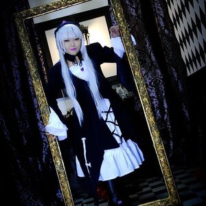 Rating: Safe Score: 0 Tags: 1girl argyle argyle_background bangs board_game book checkered checkered_background checkered_floor chess_piece choker curtains dress hat long_hair mirror perspective reflection sitting solo suigintou tile_floor tiles User: admin