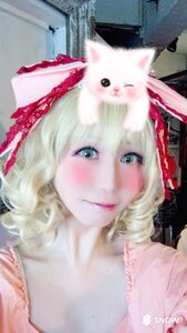 Rating: Safe Score: 0 Tags: 1girl animal animal_on_head artist_name blonde_hair blurry blush cat closed_mouth depth_of_field green_eyes hinaichigo japanese_clothes kimono lips looking_at_viewer photo portrait smile solo User: admin