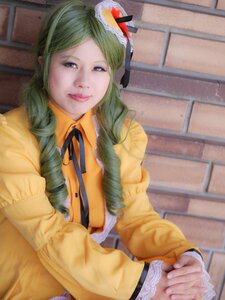 Rating: Safe Score: 0 Tags: 1girl braid drill_hair green_hair hair_over_shoulder holding_hands interlocked_fingers kanaria long_hair ribbon solo twin_drills User: admin