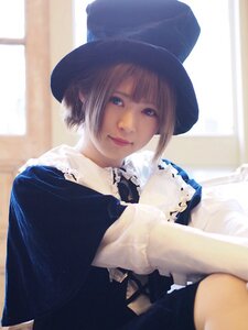 Rating: Safe Score: 0 Tags: 1girl bangs blonde_hair blue_eyes closed_mouth dress hat indoors lips long_sleeves looking_at_viewer short_hair sitting smile solo souseiseki sunlight upper_body window User: admin