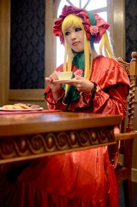 Rating: Safe Score: 0 Tags: 1girl blonde_hair blue_eyes blurry blurry_background bonnet bow cup depth_of_field dress flower long_hair long_sleeves looking_at_viewer photo pink_flower pink_rose red_dress rose saucer shinku sitting solo table teacup User: admin