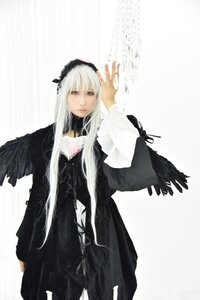Rating: Safe Score: 0 Tags: 1girl bangs black_wings closed_mouth dress feathers hairband long_hair long_sleeves looking_at_viewer red_eyes solo standing suigintou white_hair wings User: admin