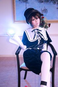 Rating: Safe Score: 0 Tags: 1girl black_eyes black_hair capelet chair flower hat indoors looking_at_viewer ribbon short_hair sitting solo souseiseki table white_legwear User: admin