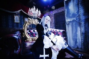 Rating: Safe Score: 0 Tags: 1girl dress frills indoors long_hair long_sleeves sitting solo suigintou white_hair User: admin